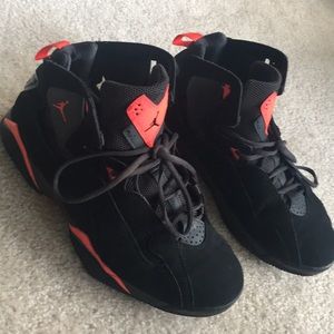 black and neon orange jordans